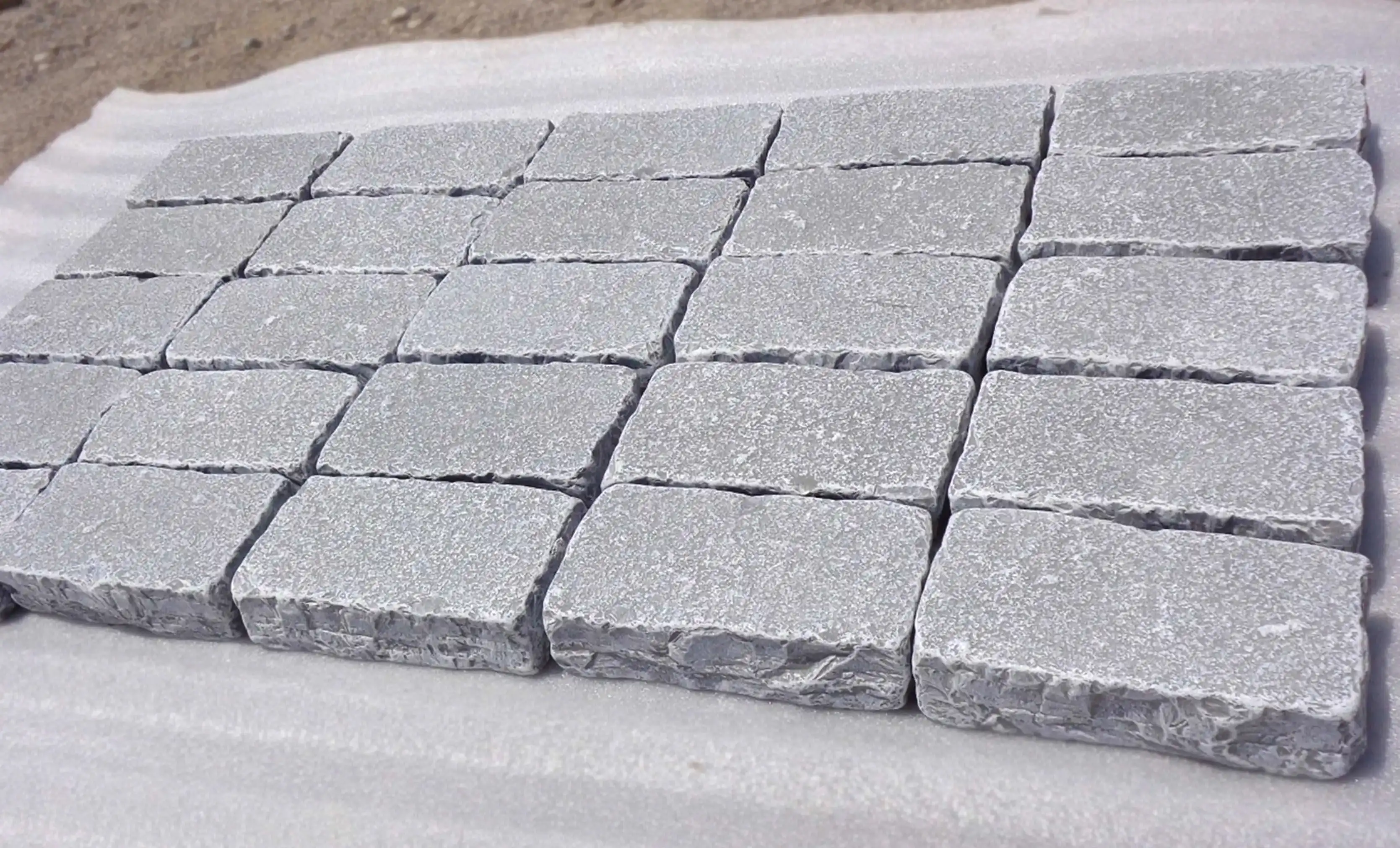 Tandur Blue — natural tumbled cobbles